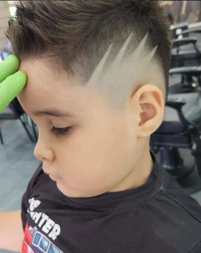 Kids haircut with a shaved design