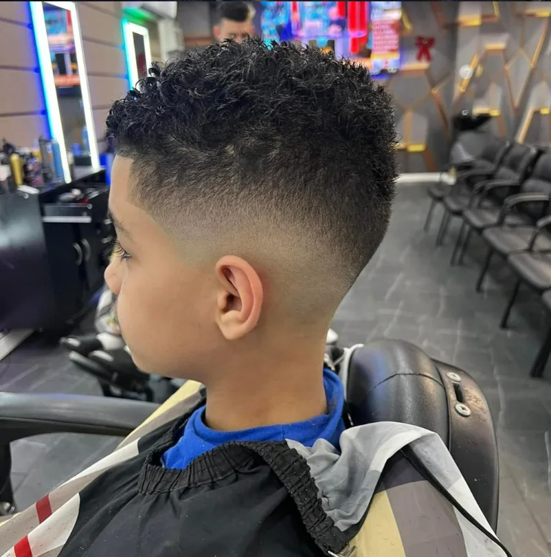 Kids fade haircut with a sharp finish